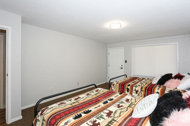 805 Columbine Rd Unit 105, Breckenridge, CO 80424 - carpeted bedroom featuring baseboards