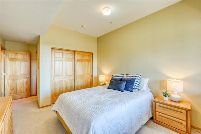 81 Cydney Ln Unit 81A, Silverthorne, CO 80498 - bedroom featuring light carpet, a closet, and baseboards