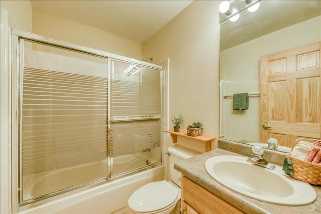 81 Cydney Ln Unit 81A, Silverthorne, CO 80498 - full bath featuring bath / shower combo with glass door, toilet, and vanity