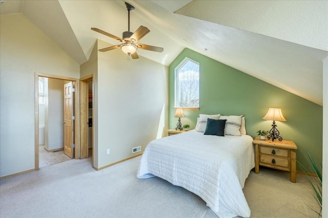 81 Cydney Ln Unit 81A, Silverthorne, CO 80498 - bedroom with lofted ceiling, baseboards, carpet, ceiling fan, and ensuite bathroom