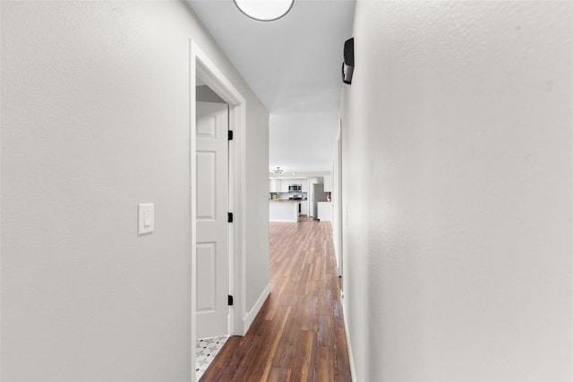 321 18th St, Kremmling, CO 80459 - hallway with wood-type flooring
