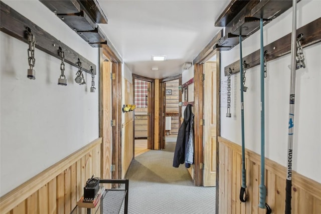 114 N French St, Breckenridge, CO 80424 - corridor with wainscoting, wooden walls, and carpet