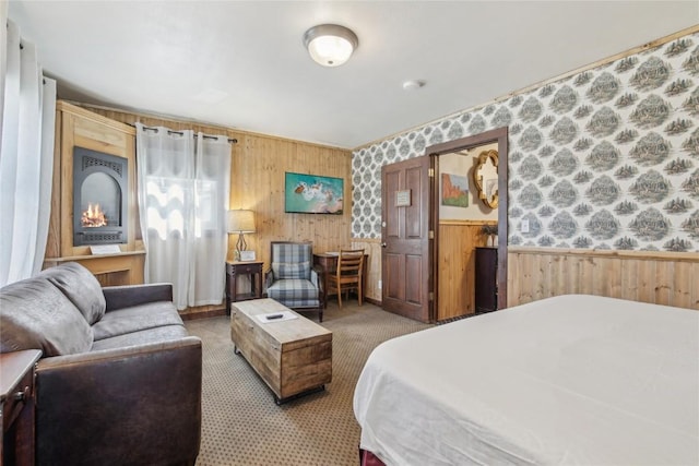 114 N French St, Breckenridge, CO 80424 - bedroom with a wainscoted wall, wooden walls, wallpapered walls, and light colored carpet
