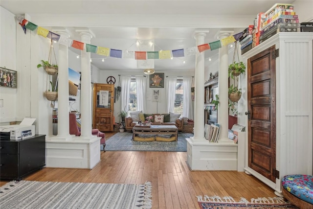 114 N French St, Breckenridge, CO 80424 - living area with decorative columns and wood-type flooring