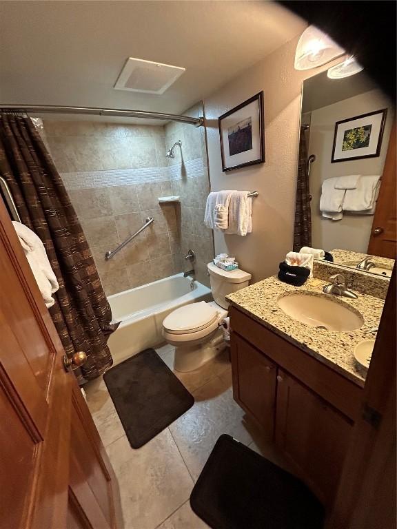 317 La Bonte St Unit 107, Dillon, CO 80435 - full bathroom with shower / bath combo, vanity, and tile patterned floors