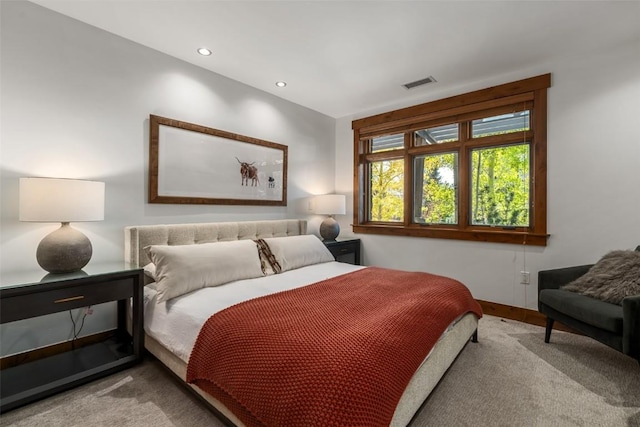 bedroom featuring recessed lighting, carpet floors, and visible vents