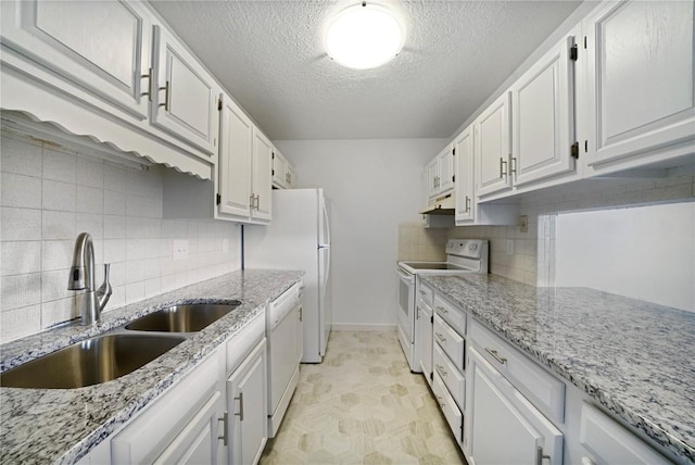 245 Straight Creek Dr Unit A, B, C, D, Dillon, CO 80435 - kitchen featuring white appliances, a sink, white cabinetry, under cabinet range hood, and a textured ceiling