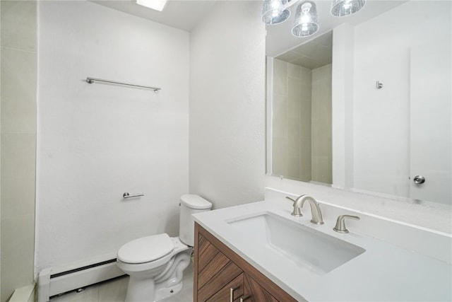 245 Straight Creek Dr Unit A, B, C, D, Dillon, CO 80435 - bathroom with a baseboard radiator, toilet, vanity, and a baseboard heating unit
