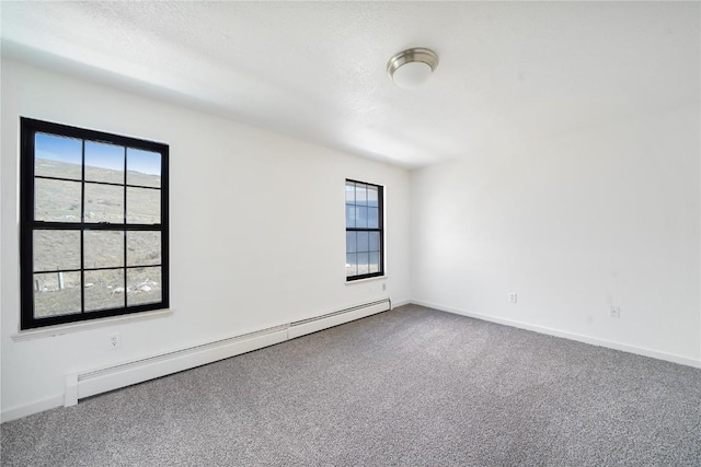 245 Straight Creek Dr Unit A, B, C, D, Dillon, CO 80435 - carpeted spare room featuring a baseboard heating unit and baseboards