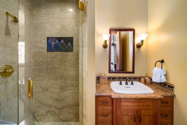 33800 Catamount Dr, Steamboat Springs, CO 80487 - full bathroom featuring a stall shower and vanity