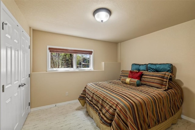 620 Parkview Dr Unit 61, Steamboat Springs, CO 80487 - carpeted bedroom with baseboards and a closet