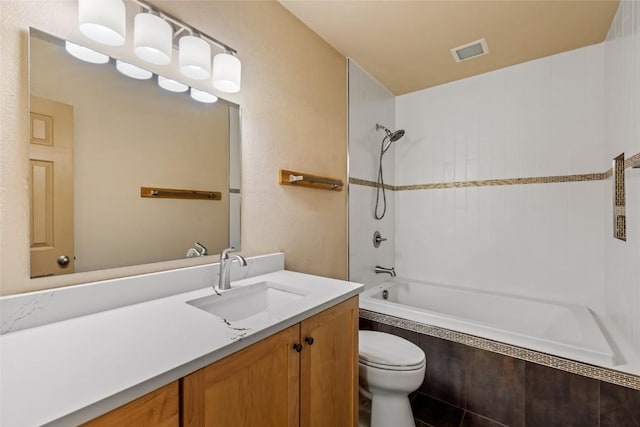 620 Parkview Dr Unit 61, Steamboat Springs, CO 80487 - full bath featuring toilet, vanity, and tiled shower / bath combo