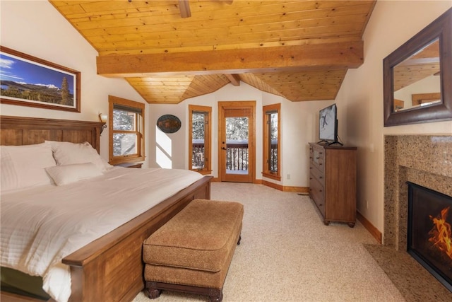 66 Chaparral Ln, Breckenridge, CO 80424 - bedroom with light colored carpet, wood ceiling, a fireplace with flush hearth, and access to outside