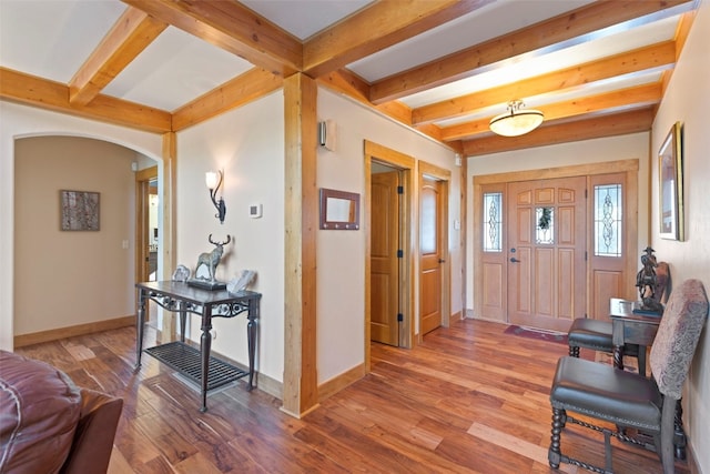 66 Chaparral Ln, Breckenridge, CO 80424 - foyer entrance featuring beam ceiling, arched walkways, and wood finished floors
