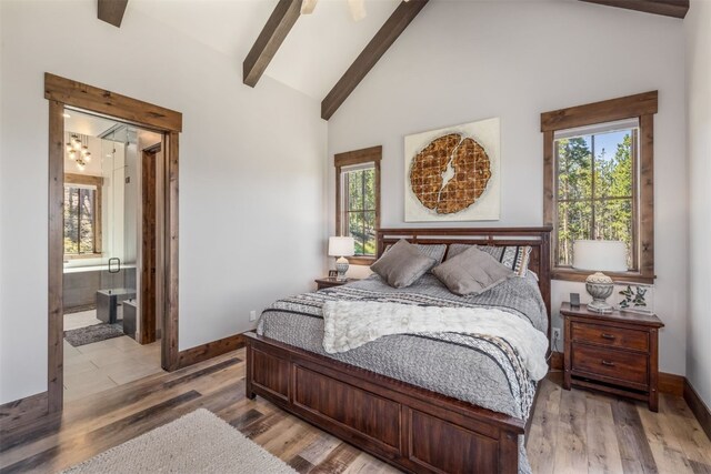 242 Point View Pl, Breckenridge, CO 80424 - bedroom featuring baseboards, light wood finished floors, ensuite bathroom, and ceiling fan