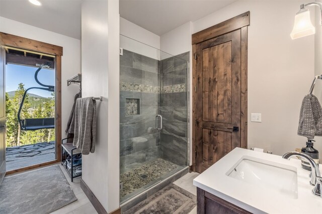 242 Point View Pl, Breckenridge, CO 80424 - bathroom with a stall shower, vanity, and tile patterned flooring