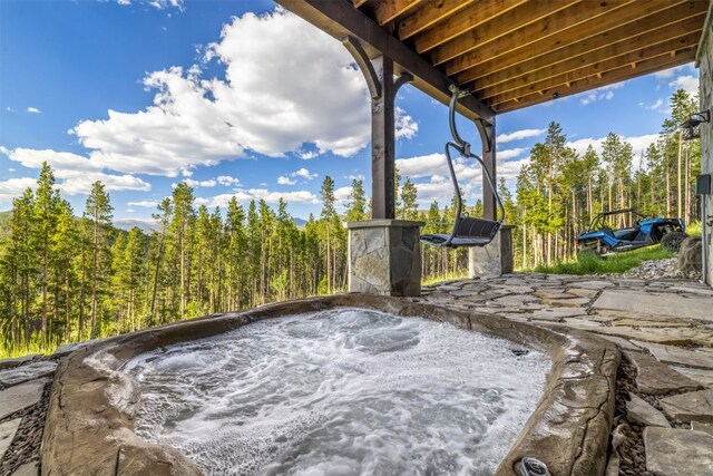 242 Point View Pl, Breckenridge, CO 80424 - view of patio / terrace with a hot tub
