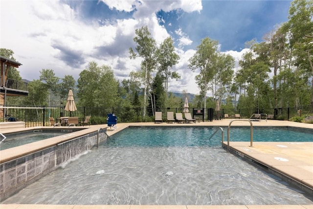 22 Vernon Way, Silverthorne, CO 80498 - community pool featuring a hot tub and a patio