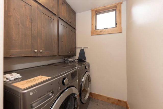22 Vernon Way, Silverthorne, CO 80498 - washroom with cabinet space, separate washer and dryer, and tile patterned flooring