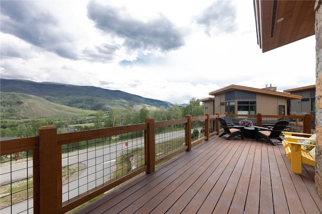 22 Vernon Way, Silverthorne, CO 80498 - wooden terrace with a mountain view