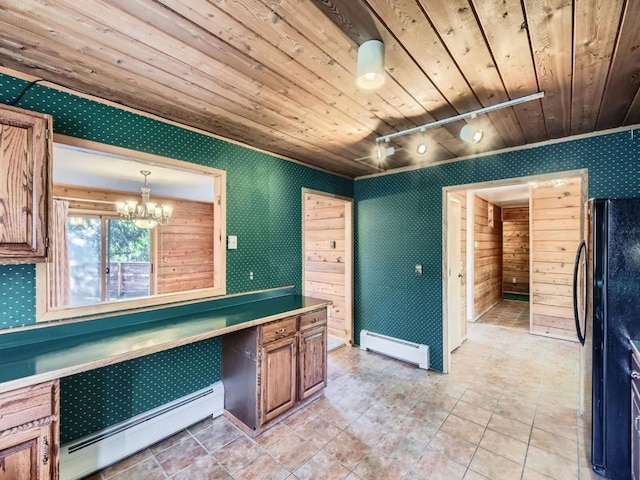 134 Hideaway Ct, Dillon, CO 80435 - kitchen featuring wallpapered walls, baseboard heating, wood ceiling, freestanding refrigerator, and track lighting