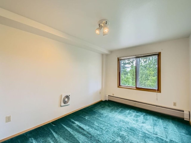 134 Hideaway Ct, Dillon, CO 80435 - empty room with a baseboard heating unit and dark colored carpet