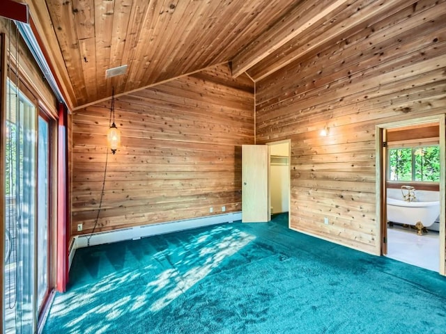 134 Hideaway Ct, Dillon, CO 80435 - empty room featuring wood walls, lofted ceiling, baseboard heating, wood ceiling, and carpet floors