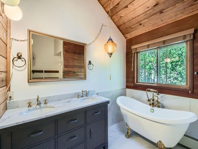 134 Hideaway Ct, Dillon, CO 80435 - bathroom with wood ceiling, vaulted ceiling, double vanity, a freestanding bath, and baseboard heating