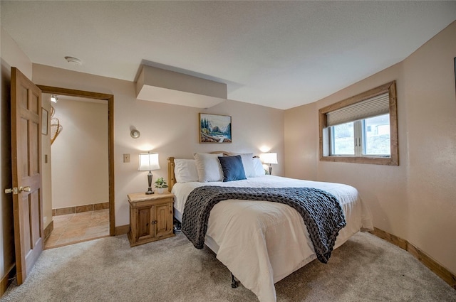 233 Burgundy Cir, Silverthorne, CO 80498 - bedroom featuring light carpet and baseboards