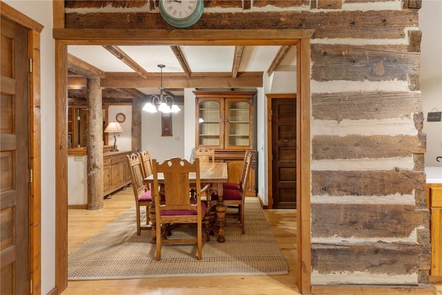 34074 Fruitland Mesa Rd, Crawford, CO 81415 - dining area featuring a chandelier, light wood-style floors, and beamed ceiling