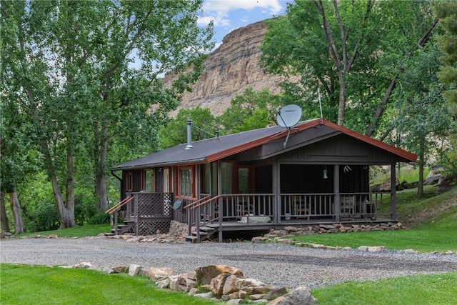 34074 Fruitland Mesa Rd, Crawford, CO 81415 - view of front facade with a porch
