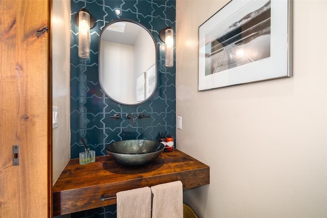 33200 Meadow Creek Dr, Steamboat Springs, CO 80487 - bathroom with vanity and wallpapered walls