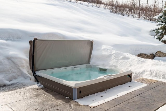 33200 Meadow Creek Dr, Steamboat Springs, CO 80487 - snow covered deck featuring a covered hot tub