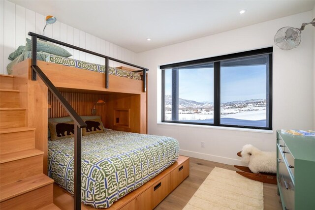 33200 Meadow Creek Dr, Steamboat Springs, CO 80487 - bedroom with wood finished floors and recessed lighting