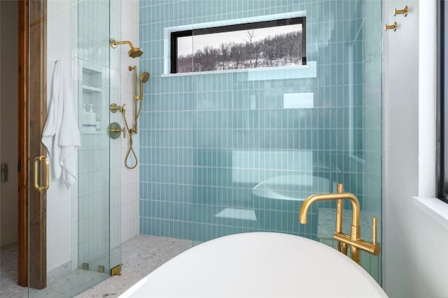 33200 Meadow Creek Dr, Steamboat Springs, CO 80487 - full bath with a stall shower and a freestanding tub