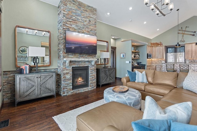 740 Cirrus Way, Granby, CO 80446 - living room with recessed lighting, an inviting chandelier, wood finished floors, visible vents, and high vaulted ceiling