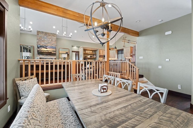 740 Cirrus Way, Granby, CO 80446 - dining area featuring wood finished floors, baseboards, a notable chandelier, beam ceiling, and recessed lighting
