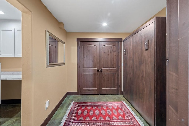 740 Cirrus Way, Granby, CO 80446 - doorway to outside with concrete flooring, baseboards, and recessed lighting