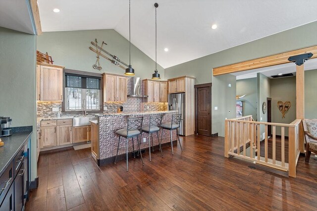 740 Cirrus Way, Granby, CO 80446 - kitchen featuring light brown cabinets, stainless steel refrigerator with ice dispenser, a sink, and wall chimney exhaust hood