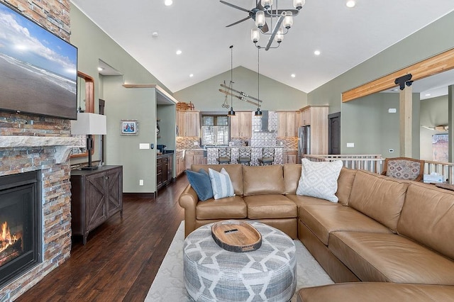 740 Cirrus Way, Granby, CO 80446 - living room featuring high vaulted ceiling, ceiling fan, a fireplace, dark wood finished floors, and recessed lighting