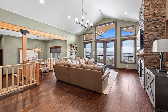 740 Cirrus Way, Granby, CO 80446 - living room with recessed lighting, high vaulted ceiling, a notable chandelier, and dark wood-style flooring