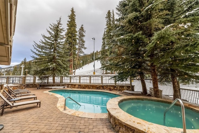 view of pool featuring a fenced backyard, a patio, and a fenced in pool