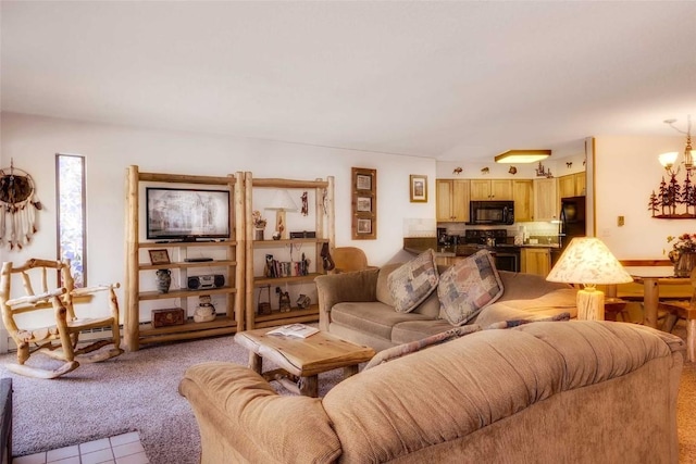 carpeted living room with an inviting chandelier and tile patterned flooring