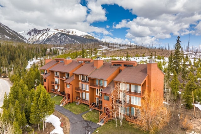 view of building exterior with a mountain view