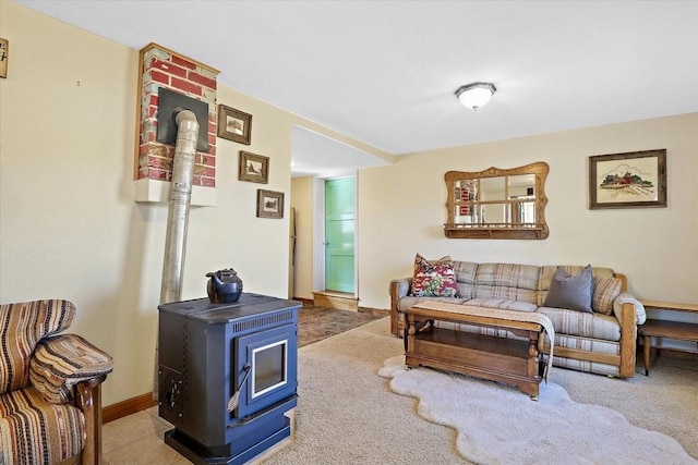 131 W Virginia St, Oak Creek, CO 80467 - carpeted living area with a wood stove and baseboards