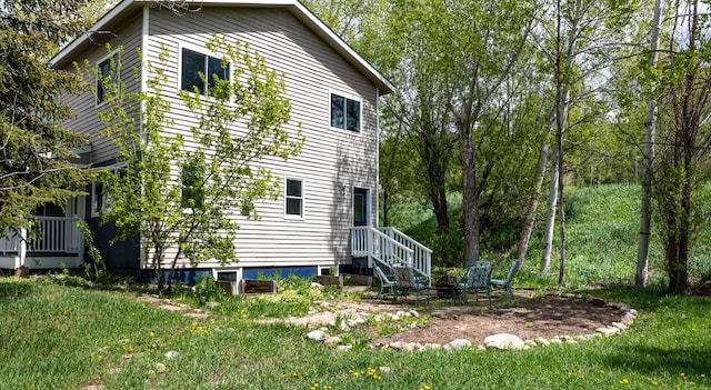 485 Amethyst Dr, Steamboat Springs, CO 80487 - view of home's exterior with a lawn