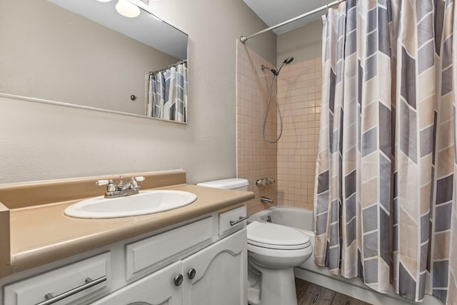 485 Amethyst Dr, Steamboat Springs, CO 80487 - bathroom with wood finished floors, vanity, toilet, and shower / tub combo with curtain