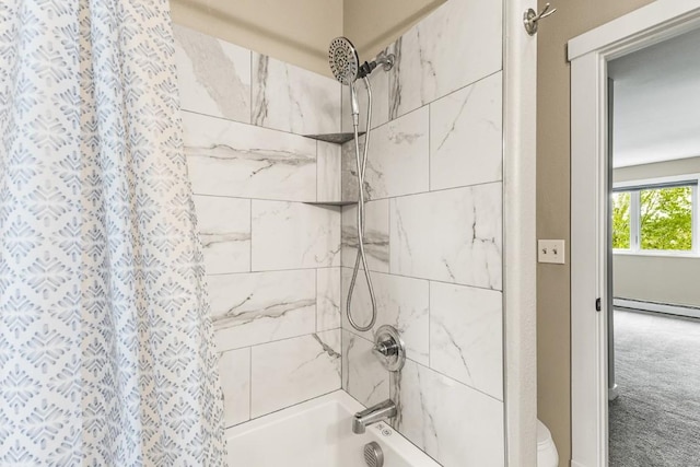 485 Amethyst Dr, Steamboat Springs, CO 80487 - full bathroom featuring shower / tub combo with curtain, a baseboard heating unit, and toilet