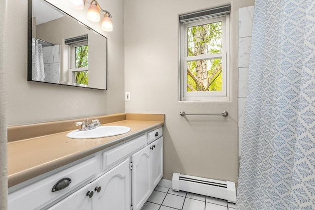485 Amethyst Dr, Steamboat Springs, CO 80487 - bathroom featuring a baseboard radiator, vanity, tile patterned flooring, curtained shower, and baseboards