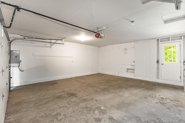 485 Amethyst Dr, Steamboat Springs, CO 80487 - garage featuring electric panel and a garage door opener